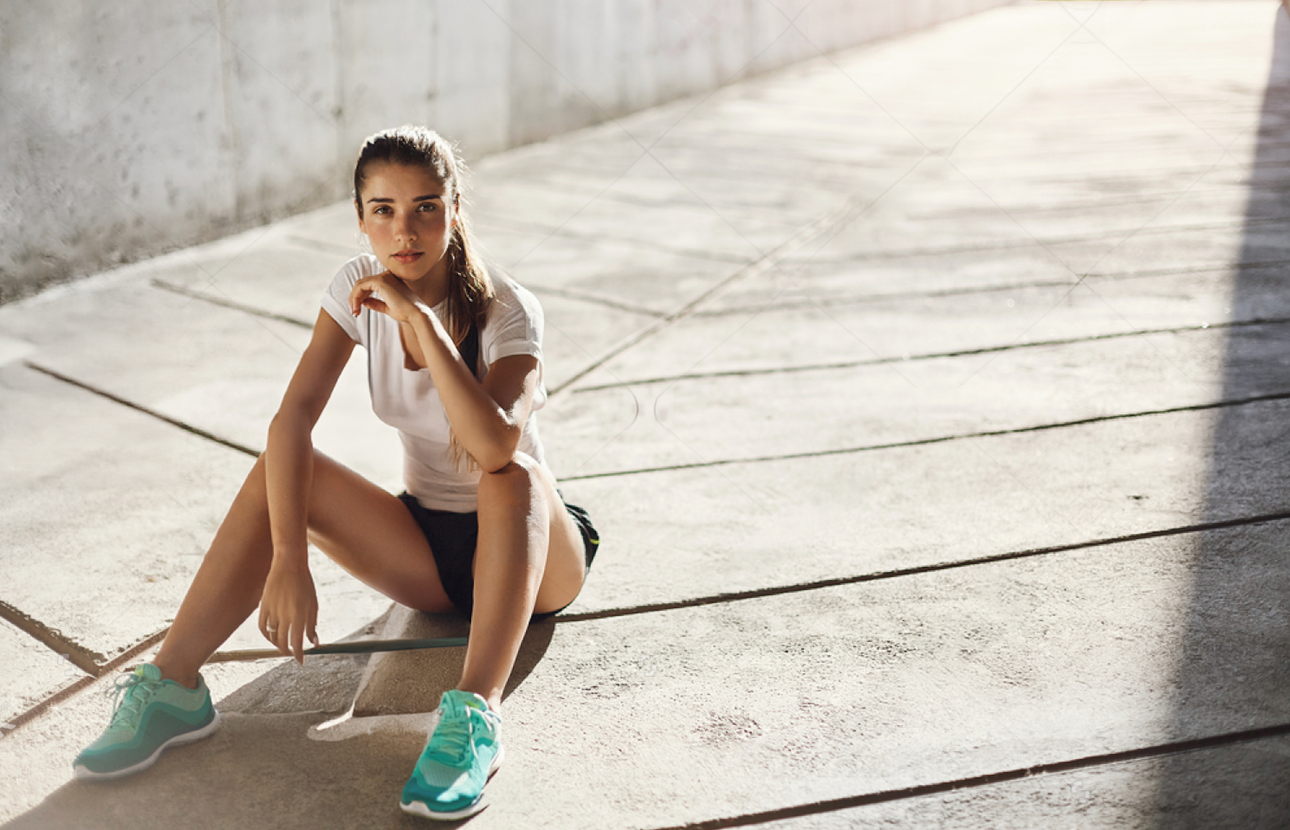Girl resting after run sitting